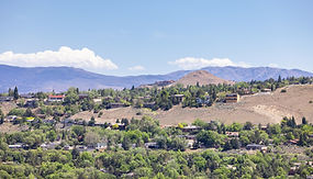residential-homes-on-top-of-a-hill-modern-city-2023-11-27-05-19-15-utc.jpg